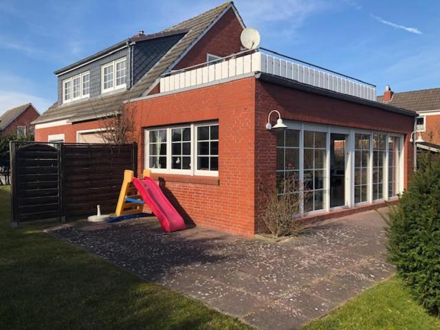Haus Pamela Wohnung A Neuharlingersiel Eksteriør bilde